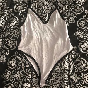 Never worn plunge back thong bodysuit